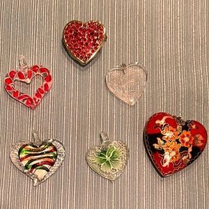 Lot of heart shaped pendants and 1 light up pin